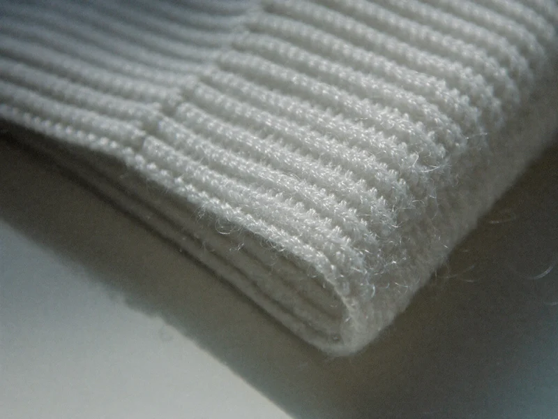 Makroansicht der Strickstruktur eines Wollsocken-Bündchens, Illustration